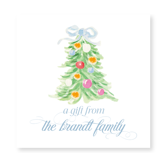 a card with a watercolor christmas tree on it